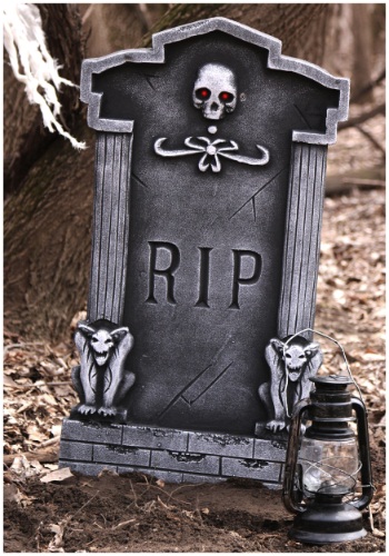 A tombstone with “RIP” on it