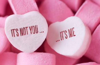 Two candies, one that says ‘It’s not you’, the other that says ‘It’s me’
