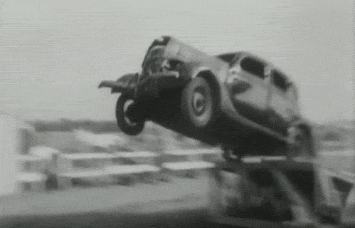 An animated gif of vintage cars crashing