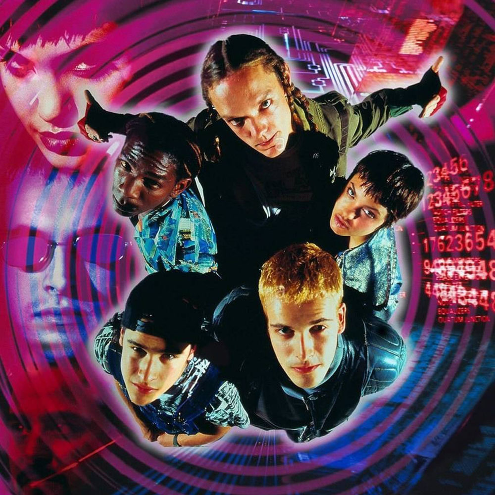 A view from above of four men, and one woman, all looking up at the camera, over a stylized digital/lighting effect background.